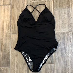 Volcom size medium solid black one piece swimsuit